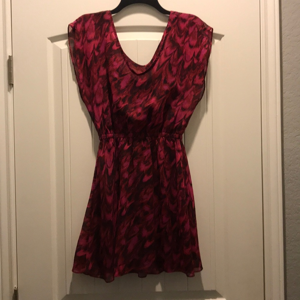Flattering dress. Gathers in the middle and flares